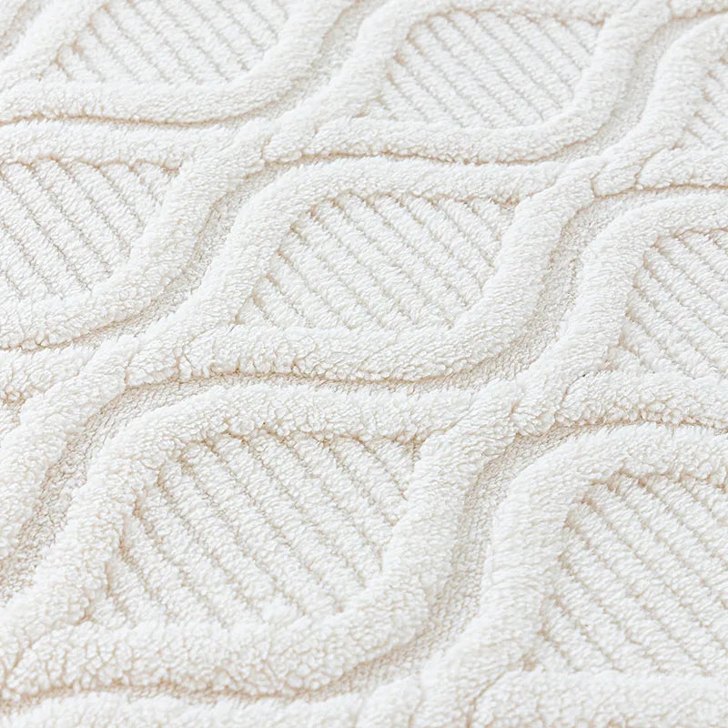 coussin canapé beige clair motif géométrique moderne fixation textile doux maison hiver