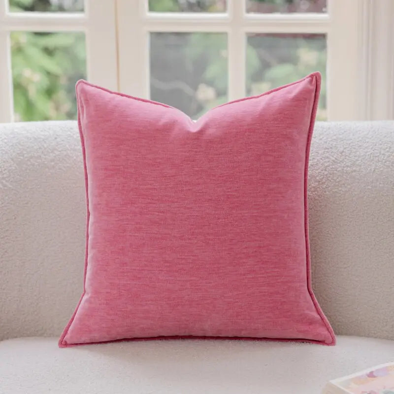 coussin deco boho chic rose blanc motif geometrique franges opaques canape lit decoration intérieure