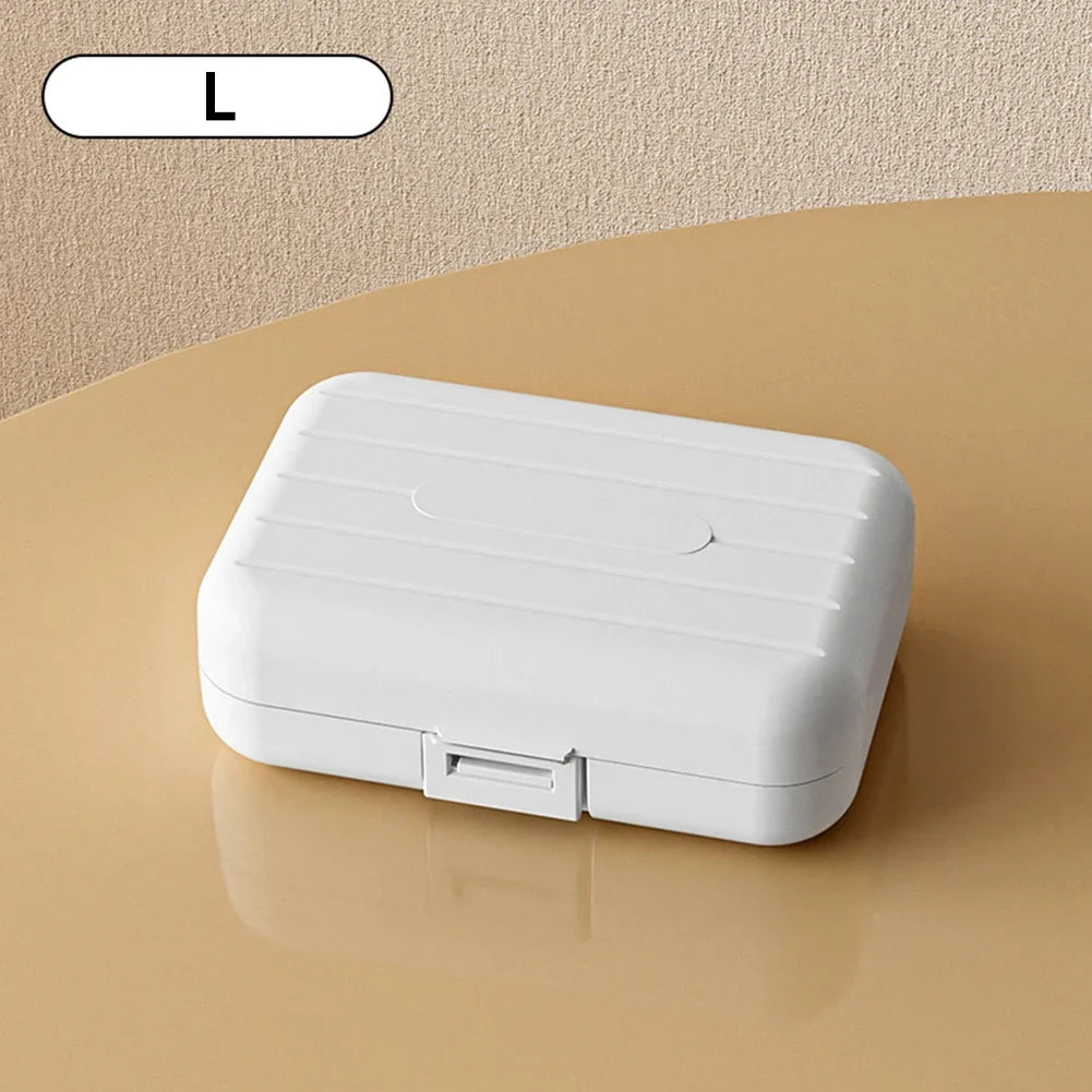 boîte pilules moderne blanc rose compartiments semaines verrouillable pratique adhésif organisateur médicaments portable