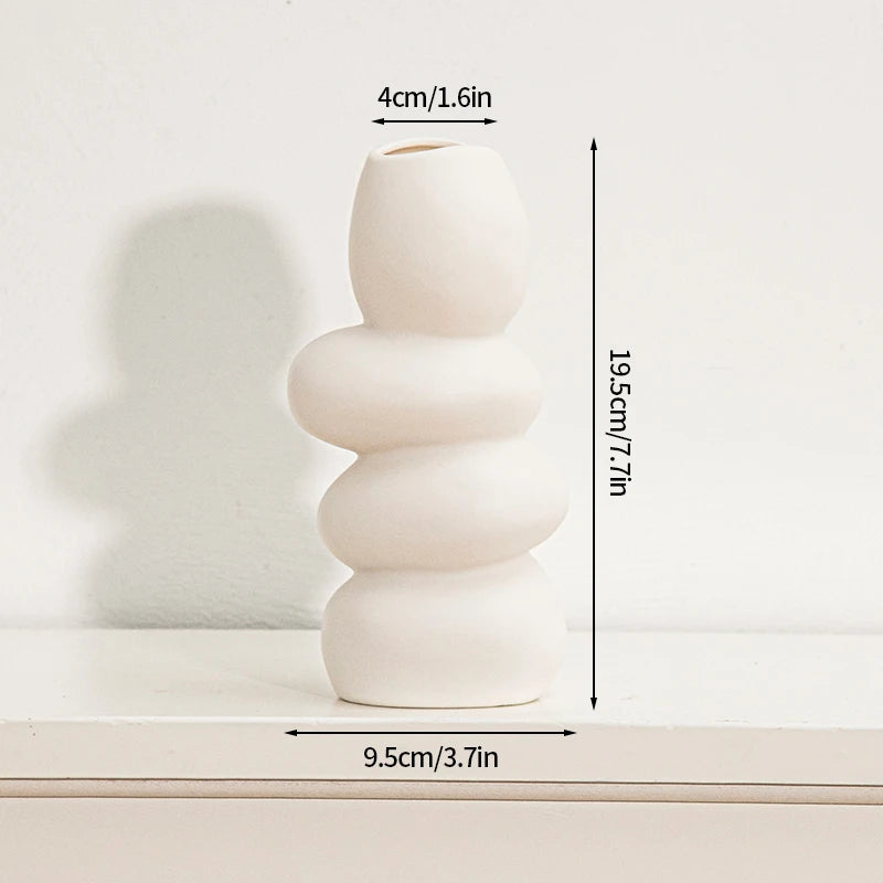 vases blancs modernes céramique rondes lignes horizontales décoration intérieure simple