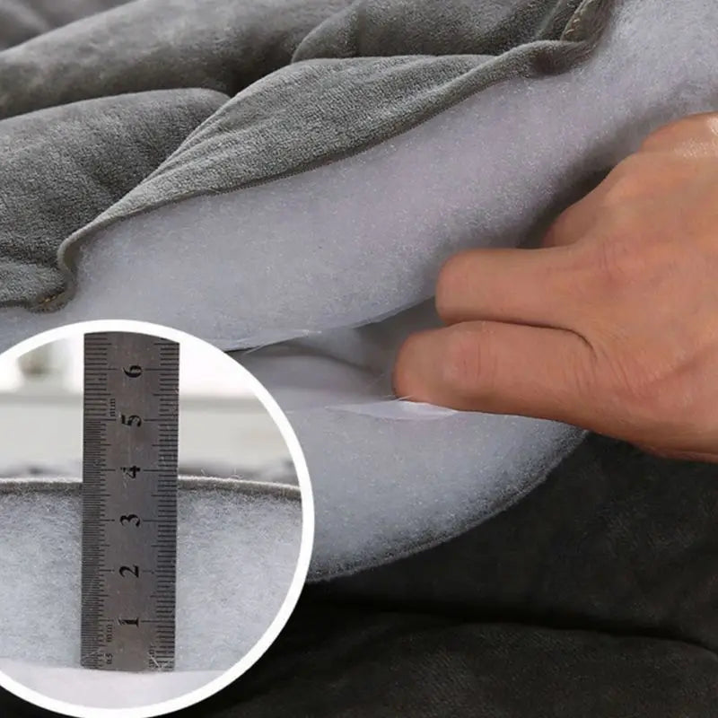 Détail du tissu matelassé double face de la tête de lit