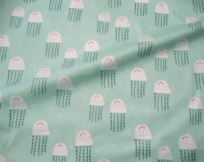 tissu coton imprimé thème marin poissons coquillages enfants blanc rose bleuclair vert