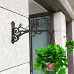 support plante suspendu oiseaux stylisés motifs floraux vis mural noir artisanal
