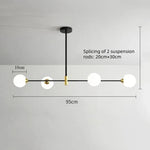 suspension lumineuse moderne minimaliste noir doré blanc sphères translucides métal poli