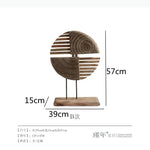 sculptures bois modernes naturel brun gris spirale franges coquillage cheval pomme bol rouleaux
