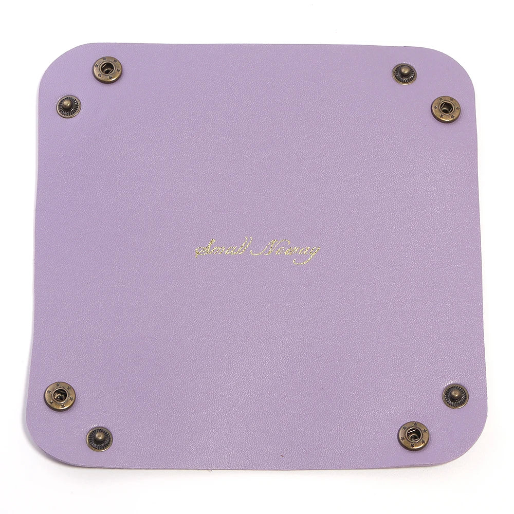 porte bijoux pliable simili cuir moderne bleu rose violet noir blanc minimaliste dorés 15x15cm