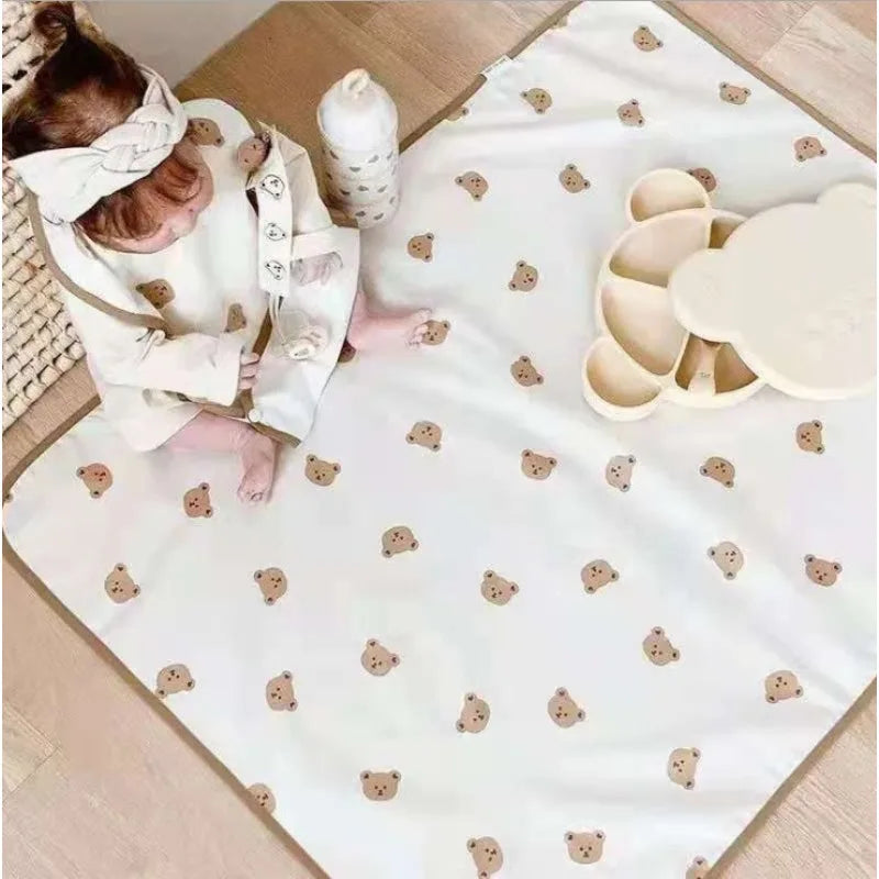 tapis jeu bébé motifs oursons soleil feuilles oursins couleurs blanc rose beige vert jaune