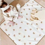 tapis jeu bébé motifs oursons soleil feuilles oursins couleurs blanc rose beige vert jaune