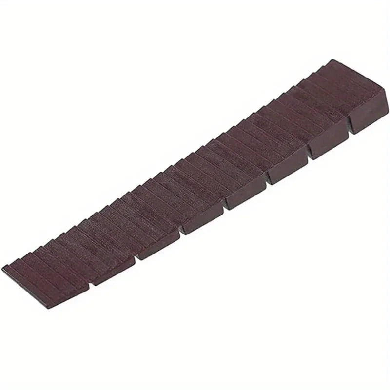 tapis nivellement meubles protection antidérapante noir marron rainures texture rugueuse minimaliste utilitaire cuisine