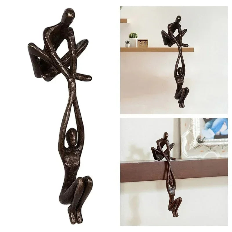 sculpture abstraite moderne deux figures humaines marron foncé pouces large pouces haute éléments decoratifsCALENDRIERplanteVERTEcadrePHOTOARGENTé