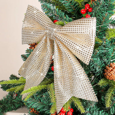 Pendentif Noël nœud diamant argent sur sapin