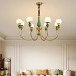 Chandelier classique vert doré globes blancs élégant chambre salon