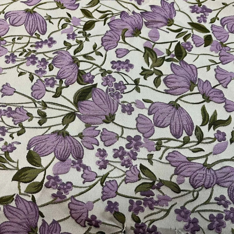 tissu polyester brocart motifs fleurs violet blanc vert protection uv largeur 145cm brodé motifs