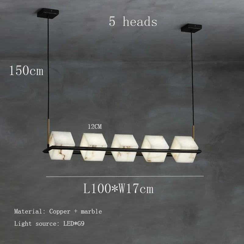 suspension lumineuse moderne marbre noir blanc or rose fixée câbles chambre salon