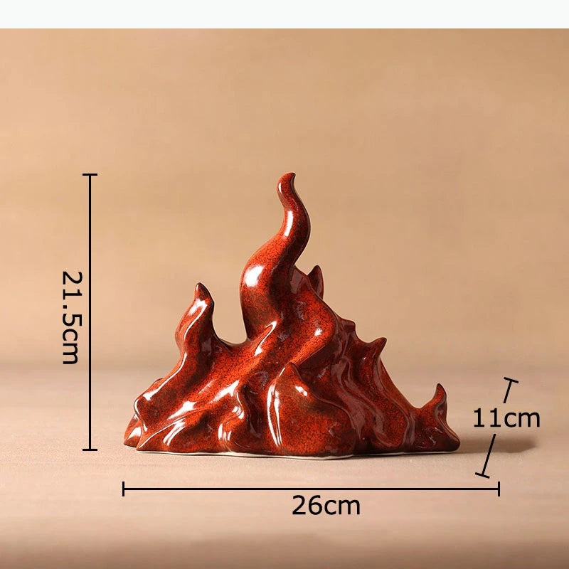 sculpture moderne flamme rouge brillante effet métallique pied bois doré