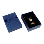 boîte rangement bijoux or rouge argent noir brillants rubis classique élégant pendentifs fermeture éclair