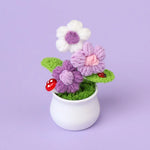 bouquet artificiel fleurs feuilles couleurs variées blanc rouge orange violet vert intérieur décoration festive