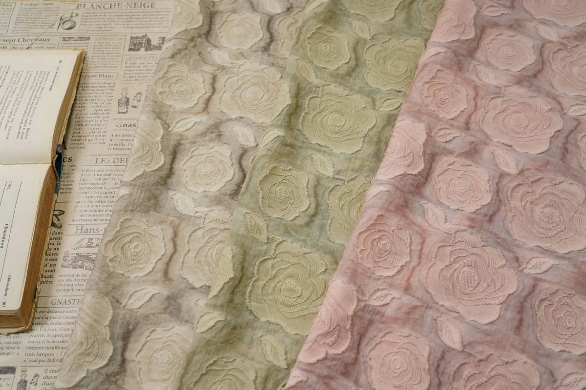 tissu brocart rose clair rose relief polyester texturé élégant opaque mètre diy création textile