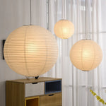 suspension lumineuse moderne blanc rayures horizontales opacité câble suspendu salon chambre principal