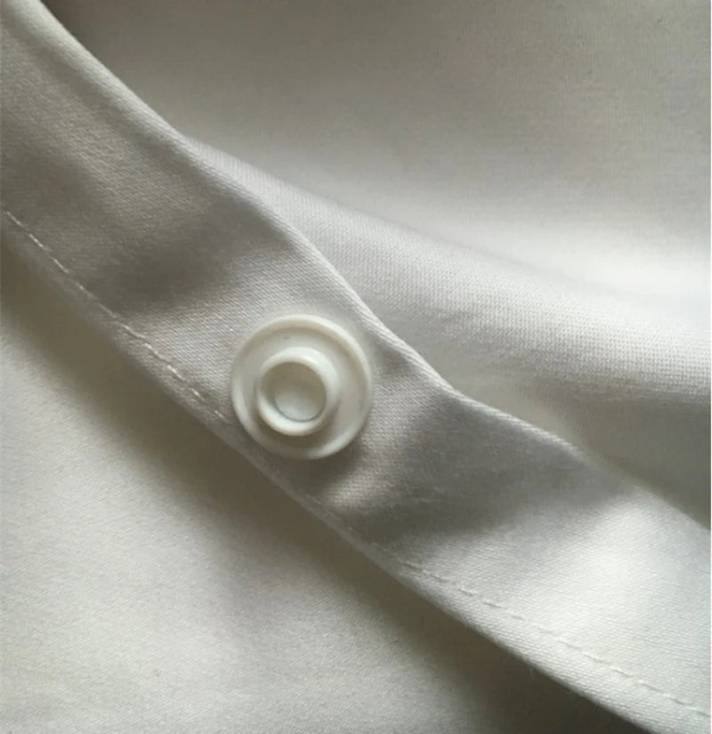 draps lit blancs satinés king size boutonnés complet moderne ecofriendly
