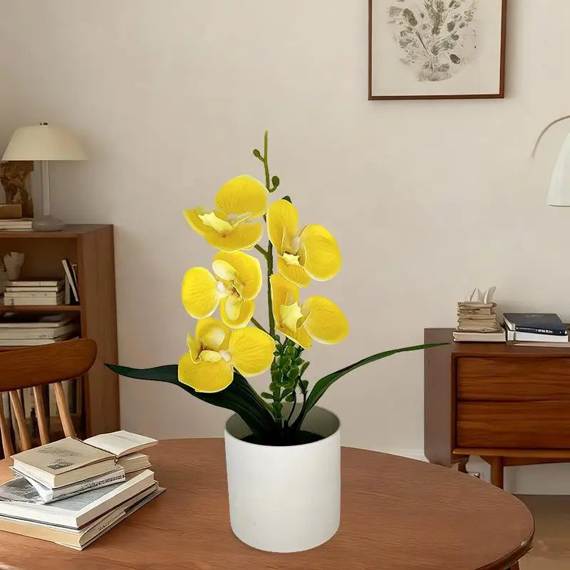 décoration intérieure orchidées artificielles pots blancs fleurs simples feuilles vertes moderne