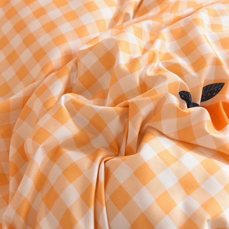 Ensemble literie orange avec drap plat et taies d'oreiller