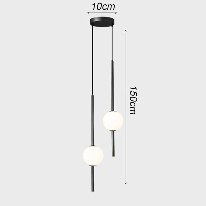 suspension luminaire moderne sphères translucides métal noir or chambre salon intérieur maison