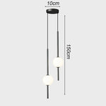 suspension luminaire moderne sphères translucides métal noir or chambre salon intérieur maison