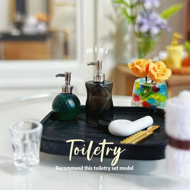 ensemble toilettes miniature résine moderne brosse dorée serviette blanche distributeur savon noir gel douche