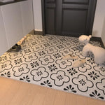 tapis d'entrée extérieur pvc noir blanc motif géométrique moderne antidérapant couloir porte
