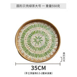 plateau rond rotin coquillages feuilles naturelles décoration boho assiette fruits pain petit déjeuner
