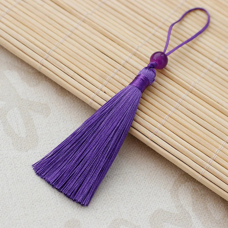 pompons décoratifs handmade rouge vert bleu violet noir classiques anneaux textiles maison