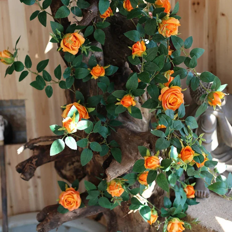 guirlande fleurs artificielles roses feuilles vertes extérieur accrochage naturelle rustique