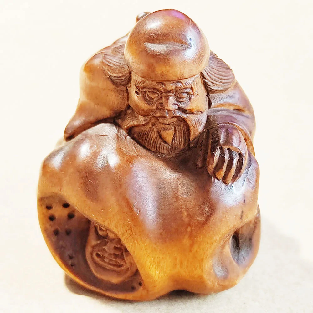 statue bois sculpture marron traditionnelle figure assise détails fins artisanale japonaise élégante objets mains
