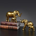 statues éléphants résine blanc noir or détails dorés classique élégant animal compagnie feng shui
