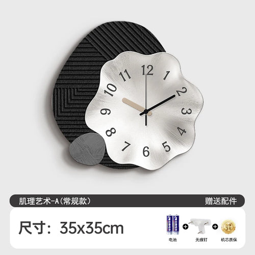 horloge murale moderne minimaliste forme organique noire grise décor salon maison chic