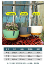 cache pot suspendu moderne vert pastel gris foncé blanc pot plastique chaînes métalliques minimaliste