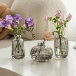 vases décoratifs modernes transparents rayures vertes fleurs maison table mariage