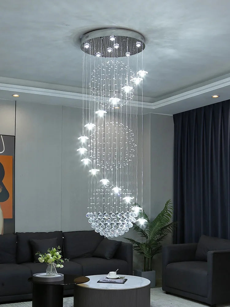 Suspension lumineuse moderne cristal transparente salon chambre étude 2000 82000 flux lumineux