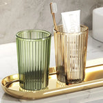 verres dents moderne transparents rayures verticales adhésifs élégants verte dorée grise brosse tube