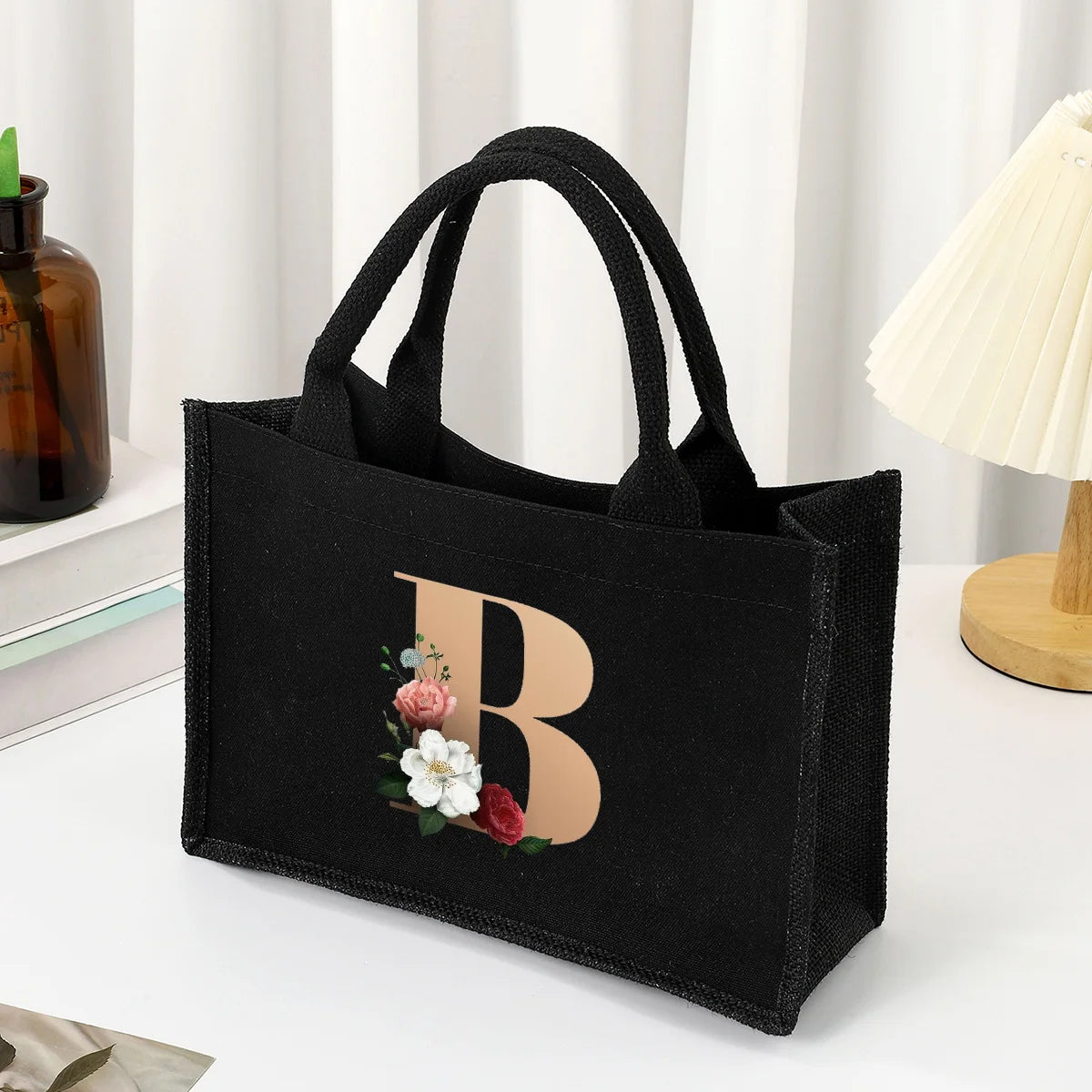 sac main femme noir toile lettres dorées fleurs poignées détachables grand moderne