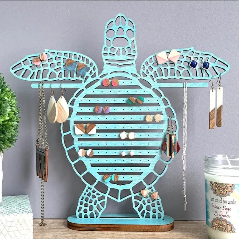 porte bijoux tortue verte bois clair ajouré motifs horizontaux naturel marin suspendu