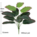 plantes artificielles vertes feuilles larges moderne decoration intérieure feuilles nervures perforations racines apparentes minimaliste