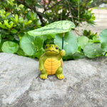 figurines animaux jardin vert beige gris cartoon éléphant grenouille tortue tringle feuilles libellules