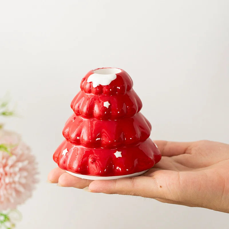 support bougie arbre noël étoiles blanches vert rouge moderne minimaliste festive ambiance chaleureuseintérieur événements