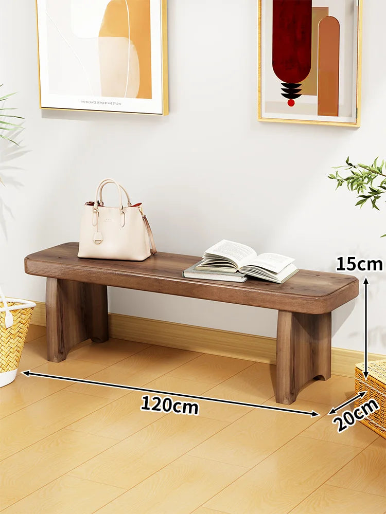 Banc bois marron clair texture naturelle moderne salon tabouret sac main livre ouvert decoration