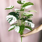 plantes artificielles feuilles vertes monstera palmes extérieures decoration moderne jardins maison tronc faux