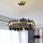 suspension lumineuse or contemporaine motifs géométriques texture pierre fixations chaînes haute luminosité