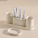 ensemble salle bain moderne brosse dents pot dentifrice distributeur savon blanc crème grain ciment