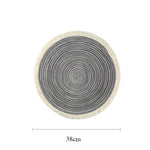 tapis table rond franges tissées beige blanc moderne respectueux environnement